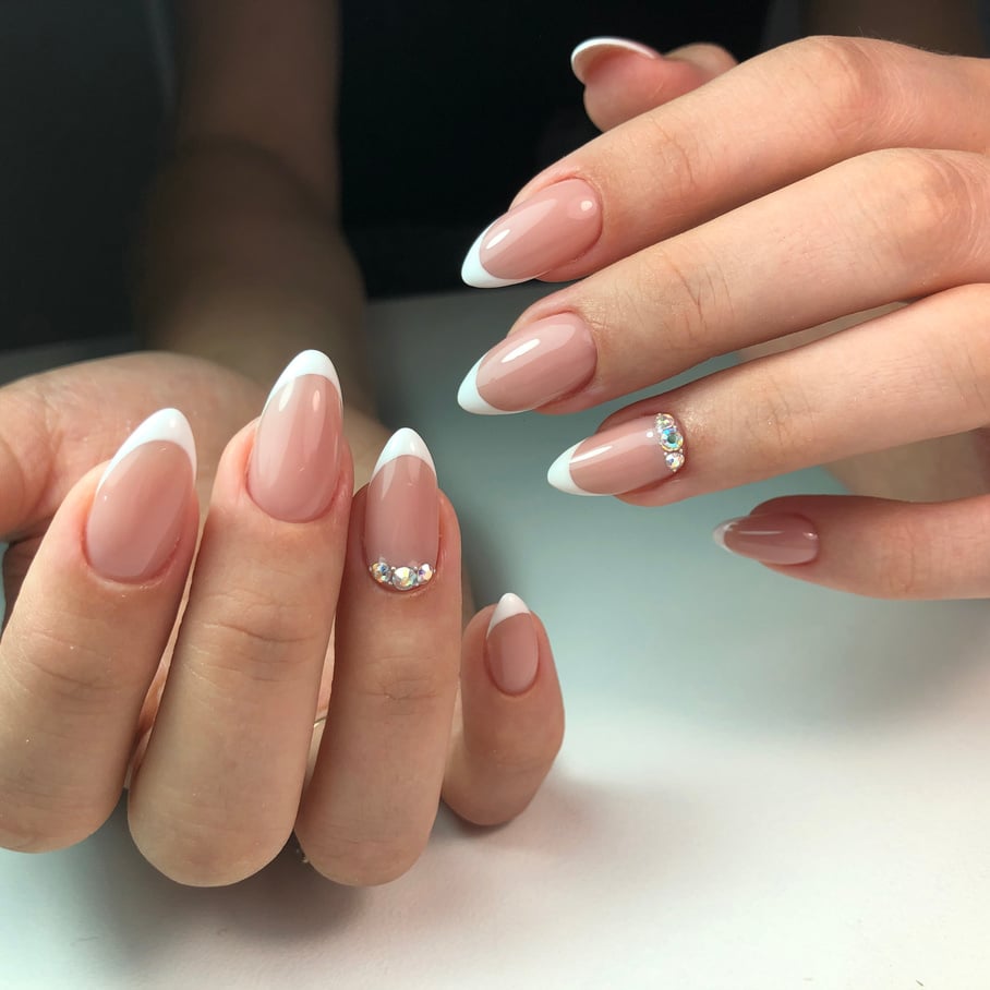 French manicure on the nails. French manicure design. Manicure gel nail polish